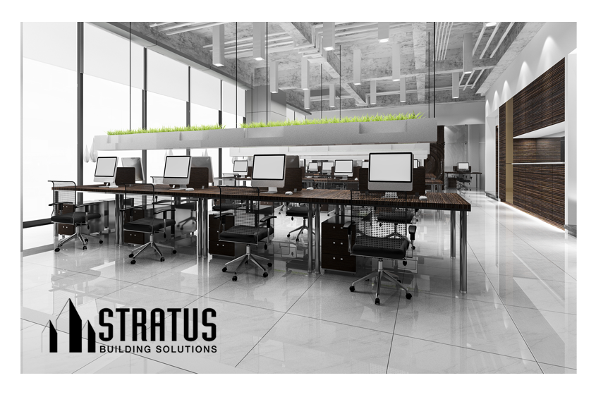 Large Office Interior with Clean White Hard Floors and Eight Computer Work Stations