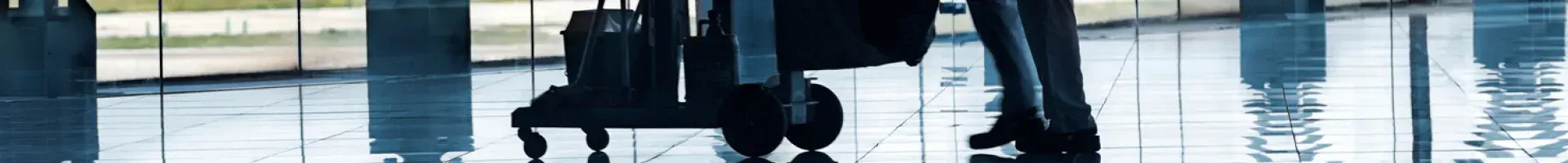 Stratus Day Porter Cleaner with Mop Bucket and Mop on a Shinny Office Floor